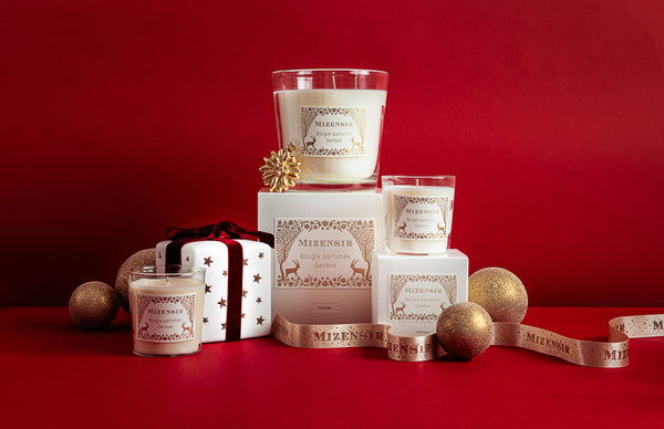 fragrance bottles on a glass table